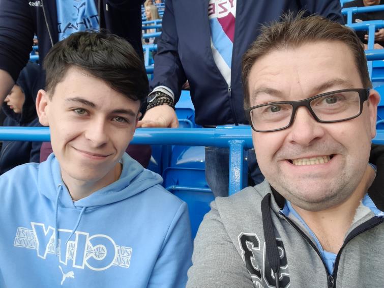 Huw and son Josh cheer on Manchester City